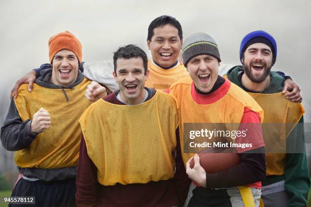 mixed race group of men who play american flag football. - mid winter ball imagens e fotografias de stock