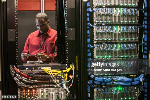 Server Rack Man Cable Management Server Rack Photos and Premium High Res Pictures ...