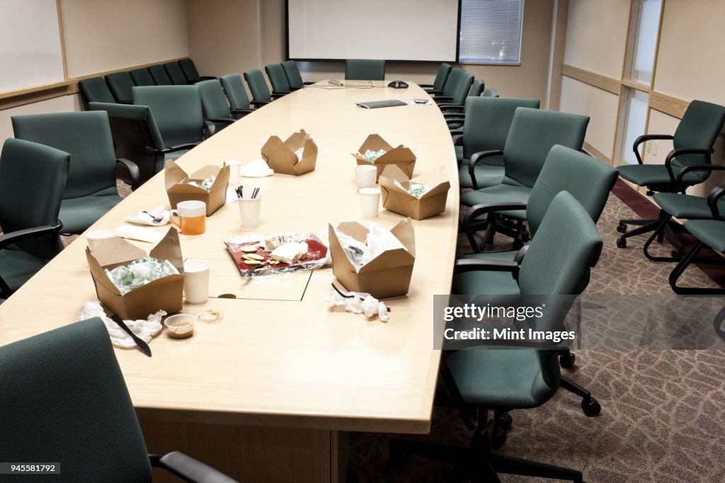 Conference room table with take out lunches