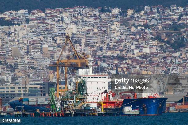 Freighter ships as seen in Thessaloniki city in Greece, having one of the largest ports in Greece and being one of the gates for cargo shipment in...