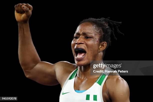 Blessing Oborududu of Nigeria celebrates victory over Divya Kakran of India in the Women's Freestyle 68 kg Semifinal on day nine of the Gold Coast...