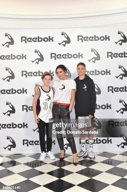 Cruz Beckham, Victoria Beckham and Romeo Beckham attend an event celebrating Reebok and Victoria Beckham celebrate their partnership. Special guest...