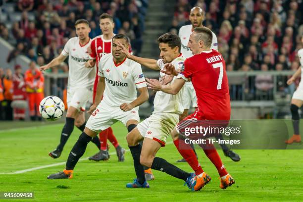 Jesus Navas of Sevilla and Franck Ribery of Muenchen battle for the ball during the UEFA Champions League quarter final second leg match between...