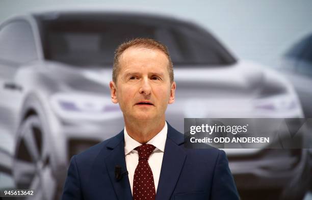 Newly appointed CEO of German car maker Volkswagen Herbert Diess arrives for a press conference at the company's headquarters in Wolfsburg, central...