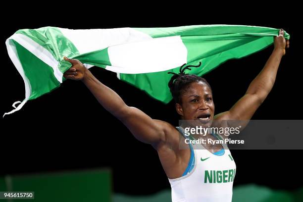 Blessing Oborududu of Nigeria celebrates victory over Danielle Lappage of Canada in the Women's Freestyle 68 kg Gold Medal match on day nine of the...