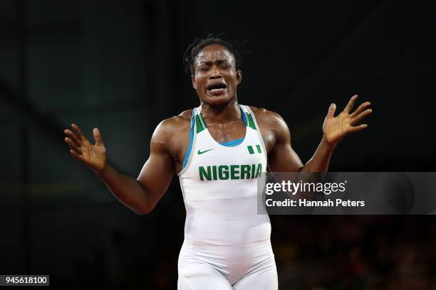 Blessing Oborududu of Nigeria celebrates victory over Danielle Lappage of Canada in the Women's Freestyle 68 kg Gold Medal match on day nine of the...