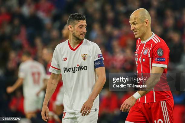 Sergio Escudero of Sevilla and Arjen Robben of Muenchen look on during the UEFA Champions League quarter final second leg match between Bayern...