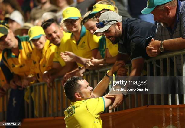 Aaron Wilson of Australia thanks supporters after winning the gold medal in the men's singles gold medal match between Aaron Wilson of Australia and...