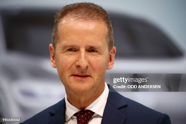 Newly appointed CEO of German car maker Volkswagen Herbert Diess gives a press conference at the company's headquarters in Wolfsburg, central...