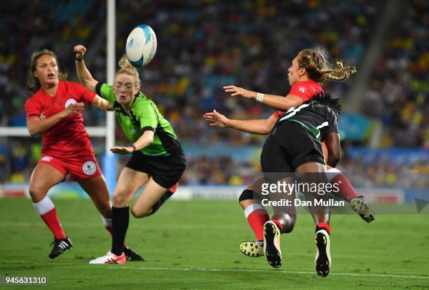 Megan Lukan of Canada is tackled by Janet Okelo of Kenya during the Rugby Sevens Women's Pool A match between Canada and Kenya on day nine of the...