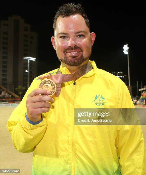 Gold medalist Aaron Wilson of Australia poses with his medal after the medal ceremony after the men's singles gold medal match between Aaron Wilson...