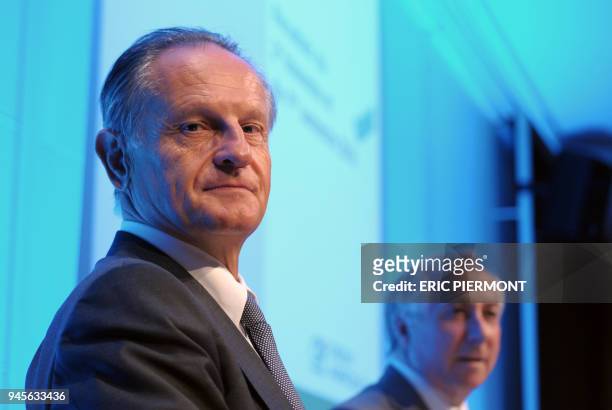 French bank Credit Agricole chief executive Jean-Paul Chifflet poses along with the Chairman of the board Jean-Marie Sander prior to address a press...