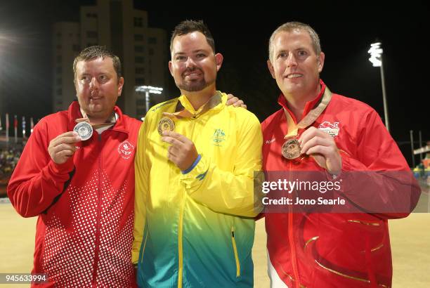 Silver medalist Ryan Bester of Canada, Gold medalist Aaron Wilson of Australia and bronze medalist Robert Paxton of England pose after the medal...