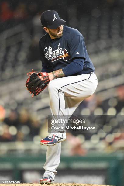 Peter Moylan of the Atlanta Braves pitches during a baseball game against the Washington Nationals at Nationals Park on April 9, 2018 in Washington,...