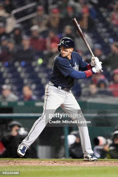 Ryan Flaherty of the Atlanta Braves prepares for a pitch during a baseball game against the Washington Nationals at Nationals Park on April 9, 2018...