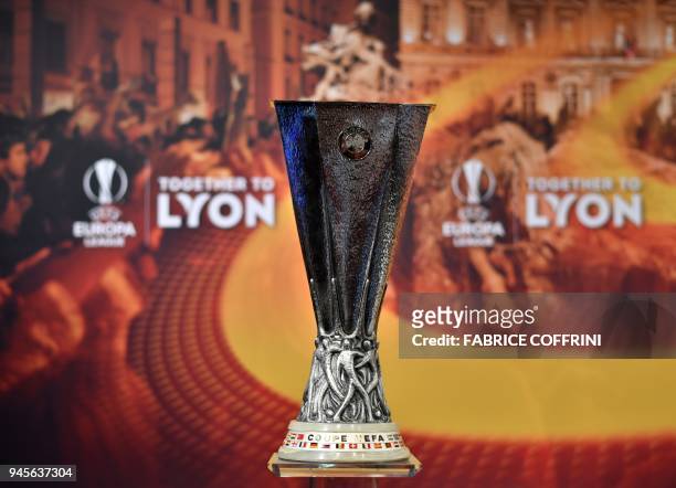 This photograph taken on April 13 shows the UEFA Europa League Trophy ahead of the draw for the semi-finals round of the UEFA Europa League football...