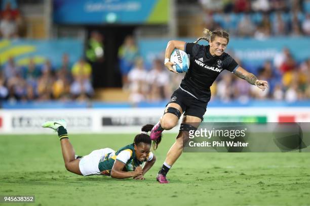 Niall Williams of New Zealand makes a break in the womens match between New Zealand and South Africa during Rugby Sevens on day nine of the Gold...