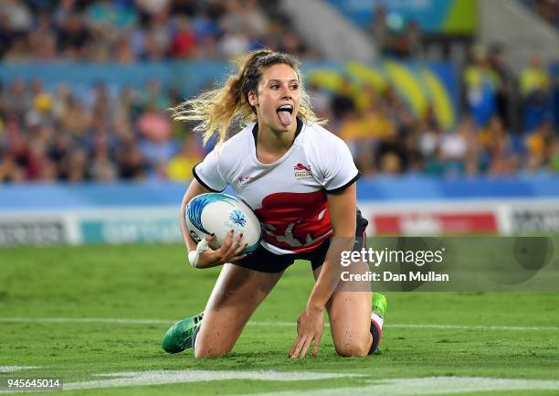 Abigail Brown of England celebrates after scoring a try during the Rugby Sevens Women's Pool B match between Australia and England on day nine of the...