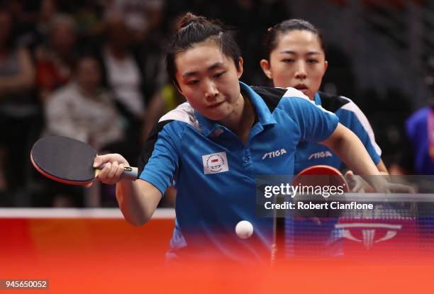 Tianwei Feng and Mengyu Yu of Singapore compete against Manika Batra and Mouma Das of India during the WomenÕs Doubles Table Tennis Gold Medal Match...