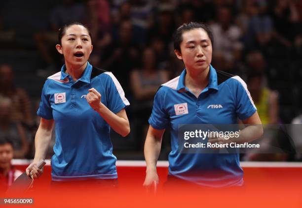 Tianwei Feng and Mengyu Yu of Singapore compete against Manika Batra and Mouma Das of India during the WomenÕs Doubles Table Tennis Gold Medal Match...