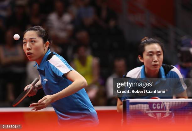 Tianwei Feng and Mengyu Yu of Singapore compete against Manika Batra and Mouma Das of India during the WomenÕs Doubles Table Tennis Gold Medal Match...