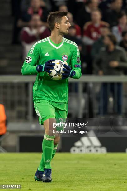 Goalkeeper Sven Ulreich of Muenchen holds the ball during the UEFA Champions League quarter final second leg match between Bayern Muenchen and...