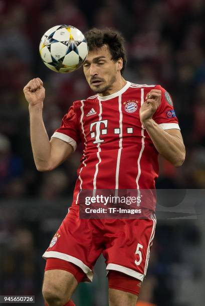 Mats Hummels of Muenchen heads the ball during the UEFA Champions League quarter final second leg match between Bayern Muenchen and Sevilla FC at...