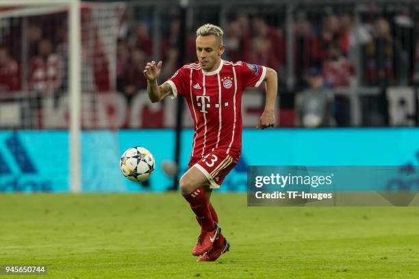 Rafinha of Muenchen controls the ball during the UEFA Champions League quarter final second leg match between Bayern Muenchen and Sevilla FC at...