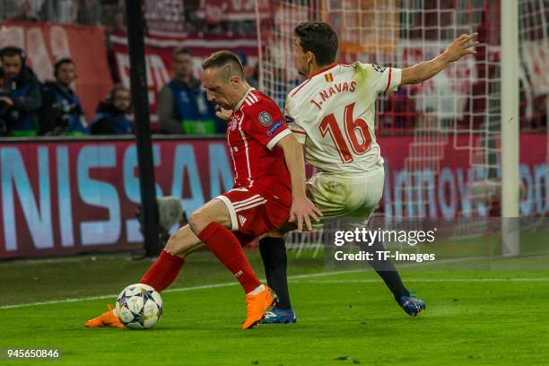 Franck Ribery of Muenchen and Jesus Navas of Sevilla compete for the ball during the UEFA Champions League quarter final second leg match between...