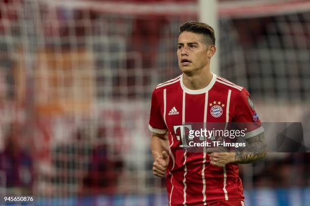 James Rodriguez of Muenchen looks on during the UEFA Champions League quarter final second leg match between Bayern Muenchen and Sevilla FC at...