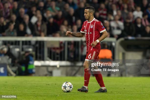 Thiago Alcantara of Muenchen controls the ball during the UEFA Champions League quarter final second leg match between Bayern Muenchen and Sevilla FC...