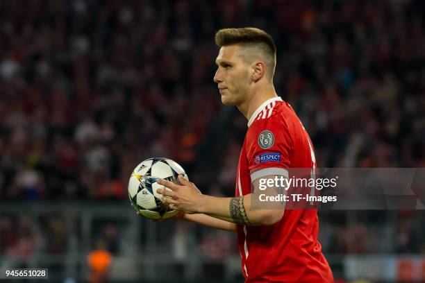 Niklas Suele of Muenchen controls the ball during the UEFA Champions League quarter final second leg match between Bayern Muenchen and Sevilla FC at...