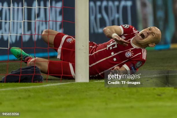 Arjen Robben of Muenchen reacts on the ground during the UEFA Champions League quarter final second leg match between Bayern Muenchen and Sevilla FC...