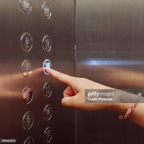 pushing elevator button - lift button stock pictures, royalty-free photos & images