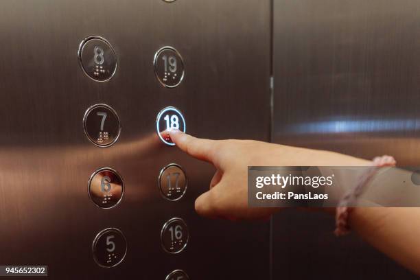 pushing elevator button - lift button stock pictures, royalty-free photos & images