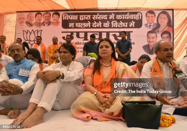 Union ministers Suresh Prabhu, Vijay Goel, Anant Geete, Narender Tomar, BJP MP Meenakshi Lekhi and other leaders during a protest against the...