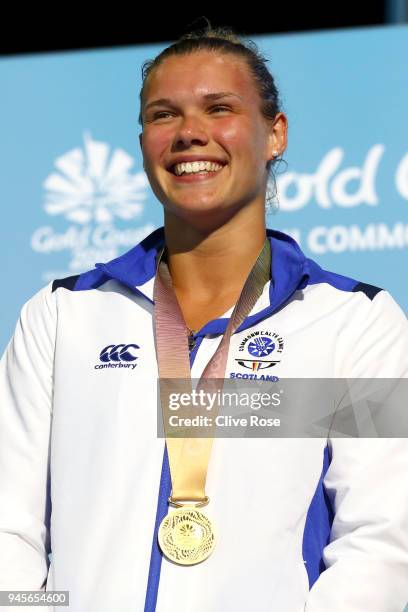 Gold medalist Grace Reid of Scotland poses during the medal ceremony for the Women's 1m Springboard Diving Final on day nine of the Gold Coast 2018...