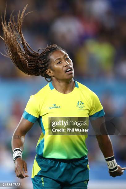 Ellia Green of Australia runs in for a try in the match between Australia and England during Rugby Sevens on day nine of the Gold Coast 2018...