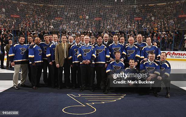 Brett Hulls Dream Team poses for a photo before a game between the St. Louis Blues and the Calgary Flames on December 15, 2009 at Scottrade Center in...