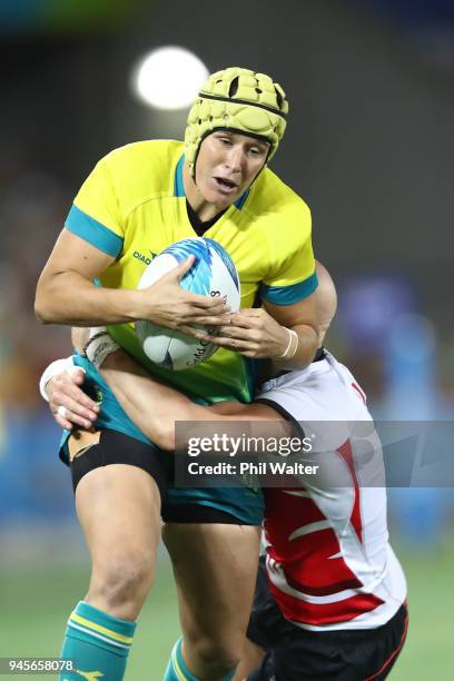 Shannon Parry of Australia in action during in the match between Australia and England during Rugby Sevens on day nine of the Gold Coast 2018...