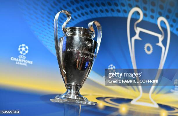 This photograph taken on April 13 shows the UEFA Champions League football cup ahead of the draw for the semi-finals round of the UEFA Champions...