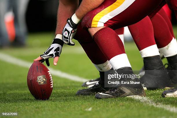 Players line up on the line of scrimmage during the Oakland Raiders game against the Washington Redskins at Oakland-Alameda County Coliseum on...