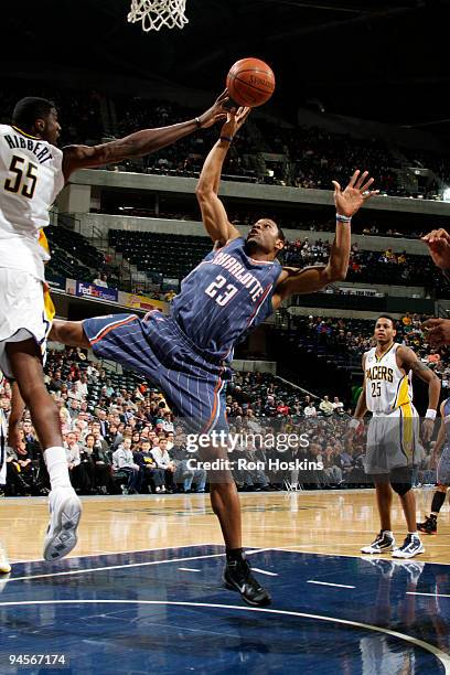 Stephen Graham of the Charlotte Bobcats shoots over Roy Hibbert of the Indiana Pacers at Conseco Fieldhouse on December 16, 2009 in Indianapolis,...