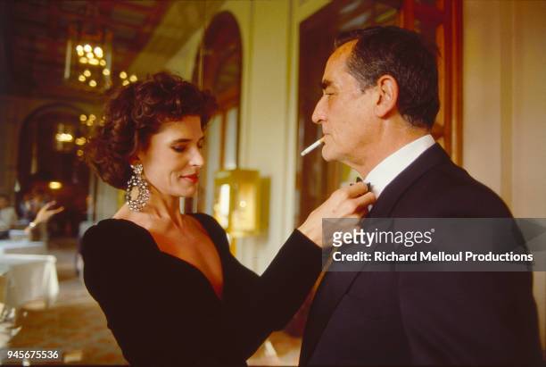 Fanny Ardant and Vittorio Gassman get ready for a reception during the Cannes Film Festival, 16 May 1987
