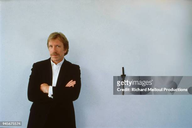 American actor Chuck Norris is in town to attend the Cannes Film Festival, 18th May 1988.