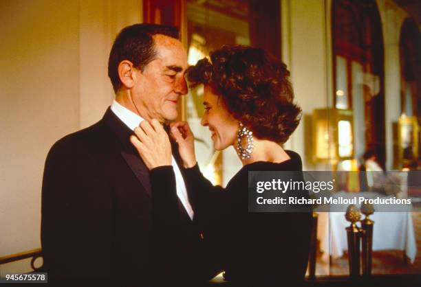 Fanny Ardant and Vittorio Gassman get ready for a reception during the Cannes Film Festival, 16 May 1987