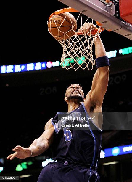 Carlos Boozer the Utah Jazz dunks against the New Jersey Nets during their game on December 16, 2009 at the IZOD Center in East Rutherford, New...