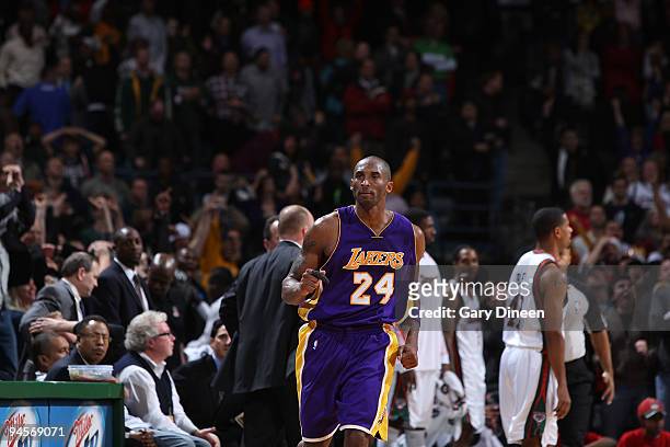 Kobe Bryant of the Los Angeles Lakers reacts after making the game-winning shot against the Milwaukee Bucks in overtime on December 16, 2009 at the...