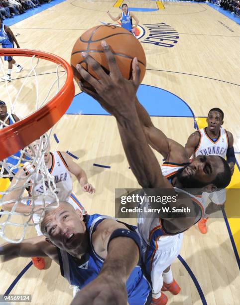 White of the Oklahoma City Thunder goes for a rebound against Jason Kidd of the Dallas Mavericks during the game at the Ford Center on December 16,...