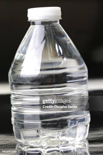 purified mineral water in clear plastic bottle - purified water stockfoto's en -beelden